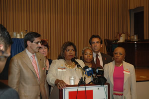 Flanked by David Pickens (left, currently his $132,000 per year “Chief of Staff”) and Dan Bugler (right, currently “Chief Officer, Research, Evaluation and Accountability” at $132,000 per year), Chicago Schools CEO Arne Duncan explains at a March 30, 2007, press conference why Chicago is going to reconstitute Harvard Elementary School despite the fact that Harvard’s ISAT test scores went “up” this school year and reconstitution is regarded nationally as a failed strategy for fixing schools whose scores went “down.” (Substance photo by George N. Schmidt) 